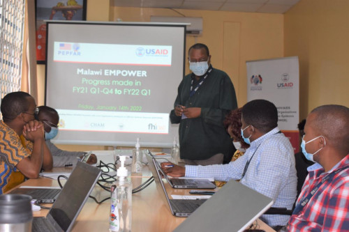 EMPOWER CoP giving introductory remarks during day 2 debriefing session
